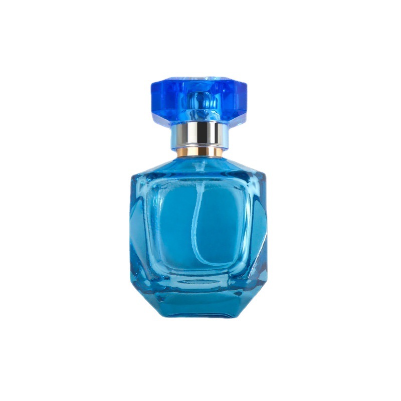 Blaue leere Glasspray-Parfümflaschen, die Glasflasche verpacken