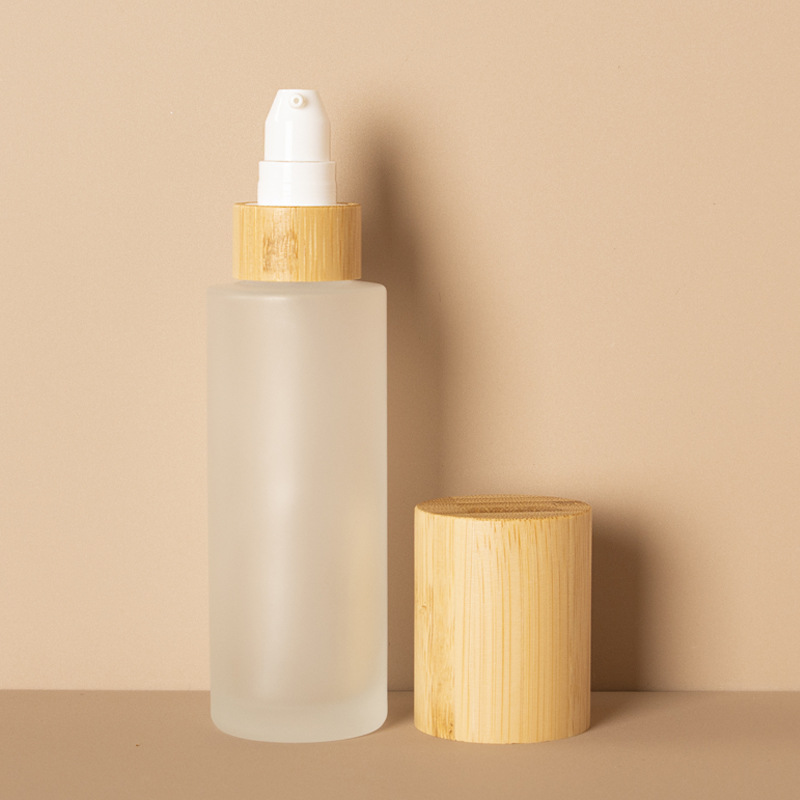Mattierte kosmetische Lotionspumpe, feiner Nebel und Lotion, Glassprühflasche mit Deckel aus Bambusholz Mattierte kosmetische Lotionspumpe, feiner Nebel und Lotion, Glassprühflasche mit Deckel aus Bambusholz
