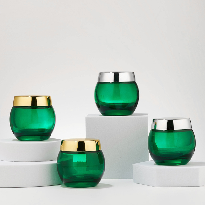 Grünes, transparentes Glas-Kosmetikglas, leeres Glas für Körperlotion Grünes, transparentes Glas-Kosmetikglas, leeres Glas für Körperlotion