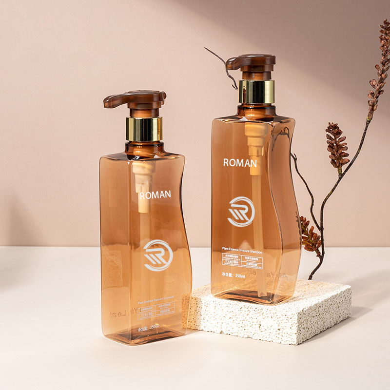 Zuverlässige 350 ml 500 ml kurvenförmige, bernsteinfarbene, leere PET-Körperlotionsflasche aus Kunststoff mit Pumpe für die Verwendung von Haarpflege, Shampoo, Spülung oder Gesichtscreme