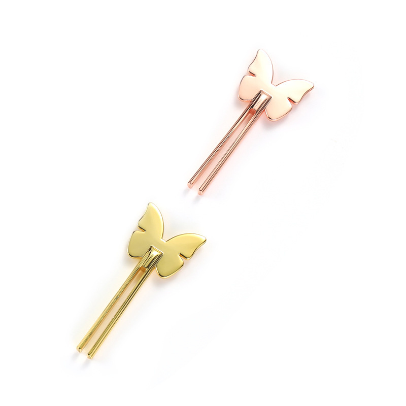 Lächelnder, blumenförmiger Tubenquetscher aus Zinklegierung Lächelnder, blumenförmiger Tubenquetscher aus Zinklegierung