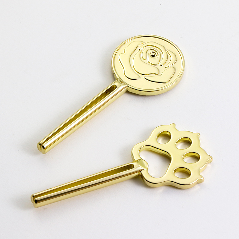 Einzigartiges Design eines katzenpfotenförmigen Tubenquetschers aus Zinklegierung für Katzenfutter Einzigartiges Design eines katzenpfotenförmigen Tubenquetschers aus Zinklegierung für Katzenfutter